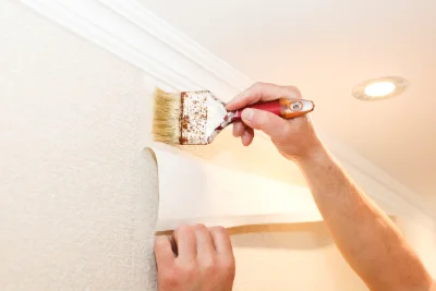 Pose de papier peint aux Noës — revêtements muraux et toiles de verre